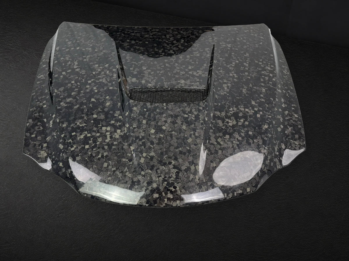 Forged carbon vented hood front view